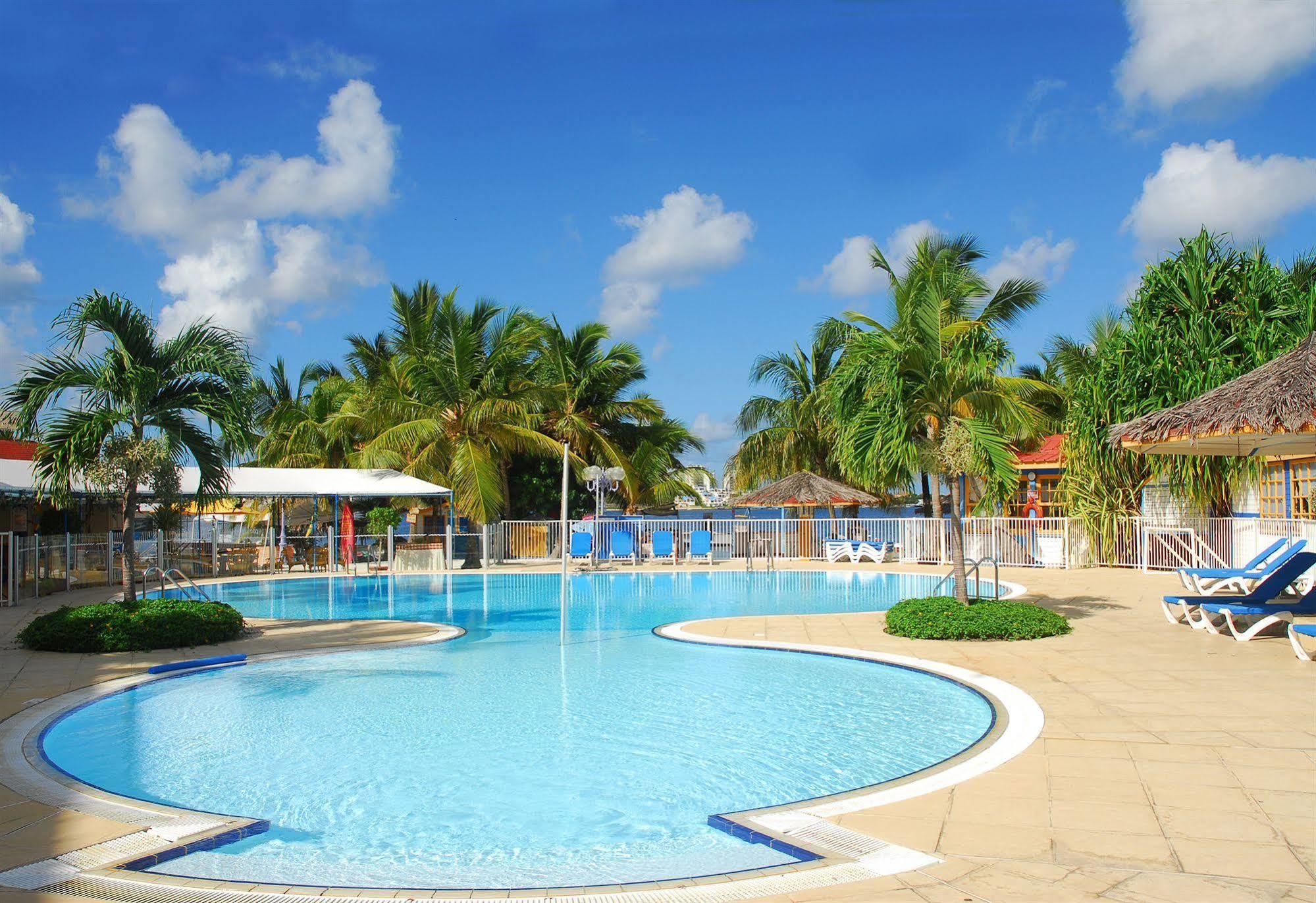 Le Flamboyant- Le Village Baie Nettle Exterior foto